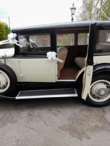 Buick Wedding Car with door open and white ribbon